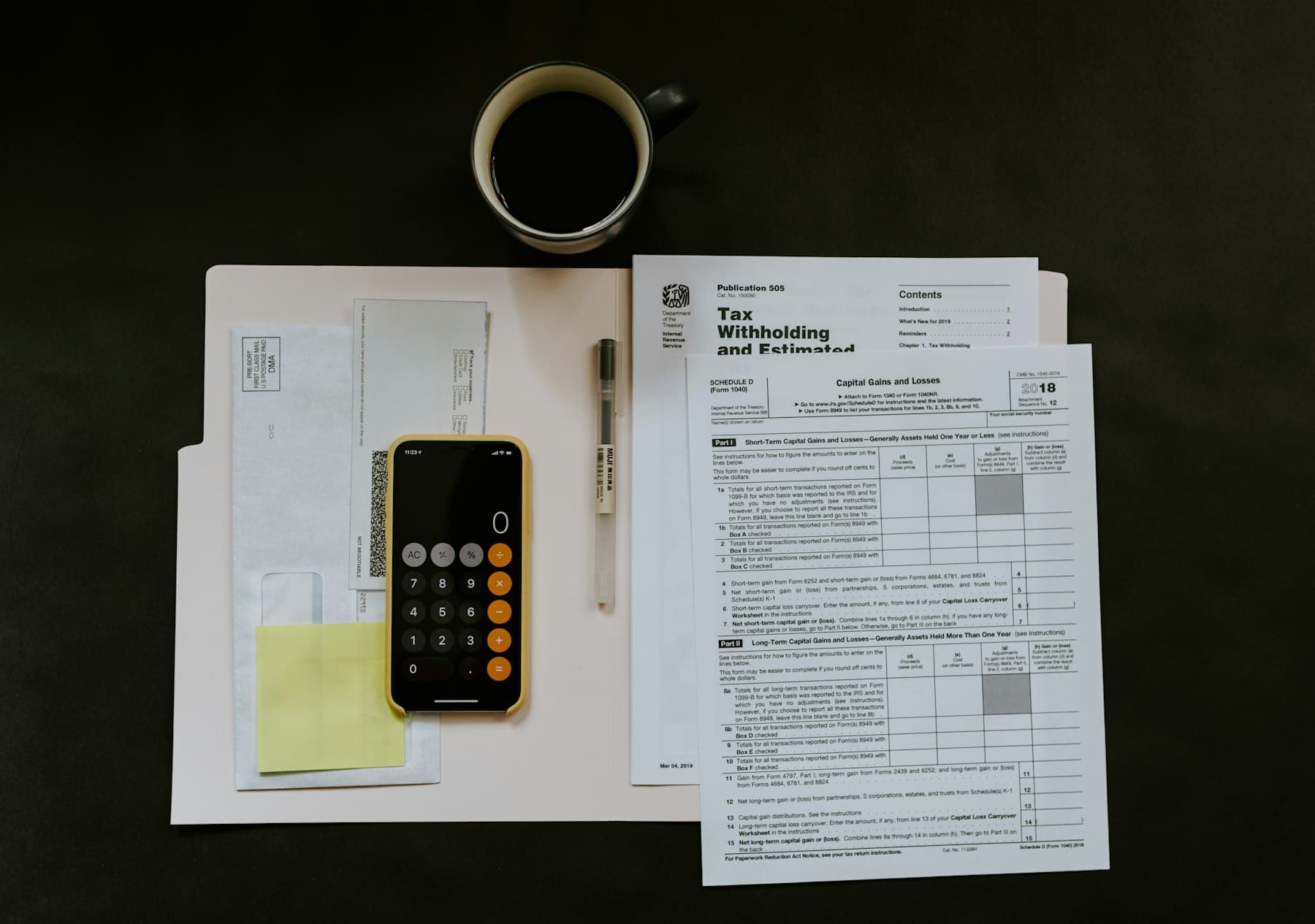 Budget documents and calculator representing website pricing